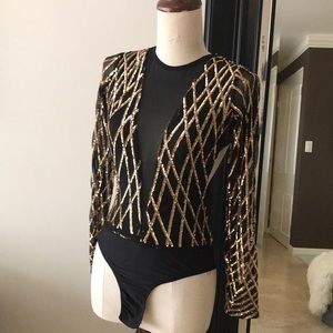 Lycra and black sequined in gold body